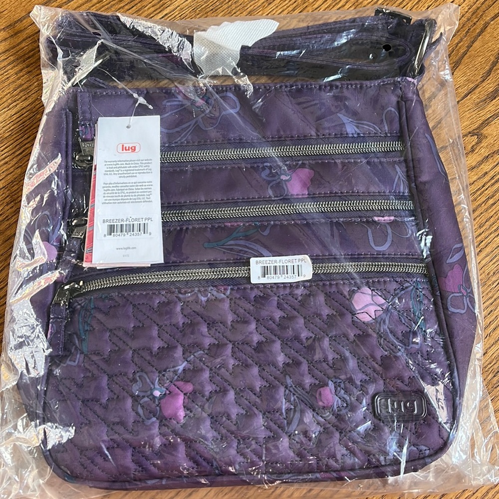 Lug breezer handbag never used